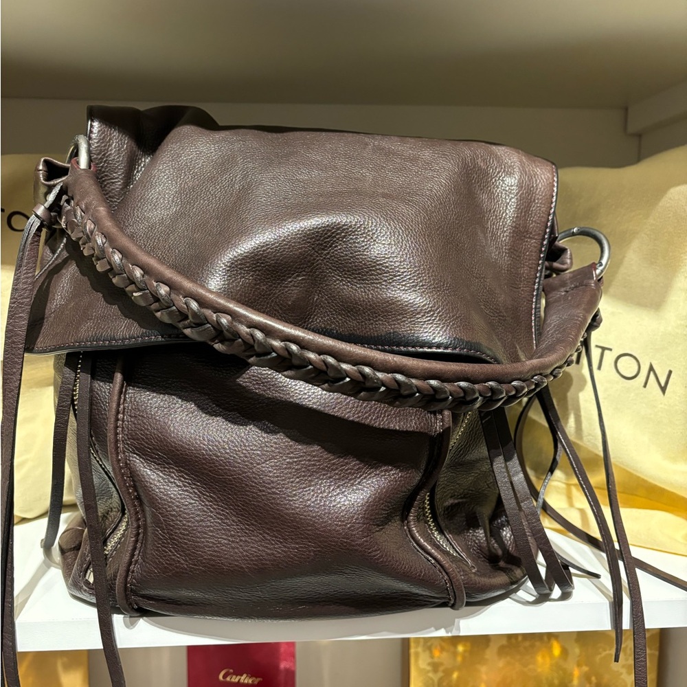 Christofer Kan Western Style Handbag

Dark brown very soft Italian leather